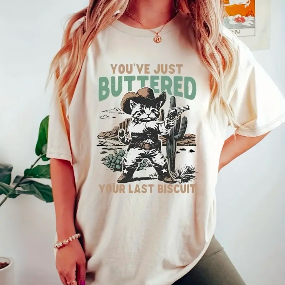 NEW “YOU’VE JUST BUTTERED YOUR LASR BISCUIT” TEE